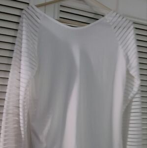 Long sleeved white top